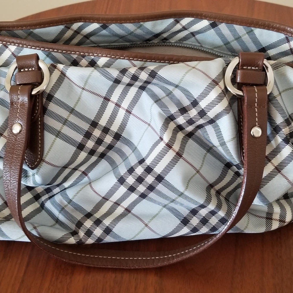 Burberry London Blue Label Vuntage Bag. Rare baby blue color. Visible stains.